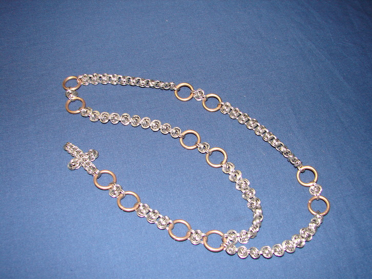 Rosary on blue sheet